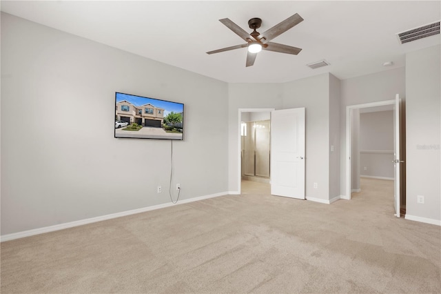 6711 Rocky Park St, Tampa, FL 33625 - unfurnished bedroom featuring light colored carpet, baseboards, and ceiling fan