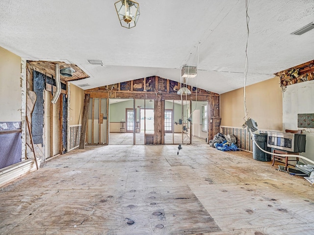 14808 Lake Magdalene Cir, Tampa, FL 33613 - miscellaneous room featuring a textured ceiling and vaulted ceiling