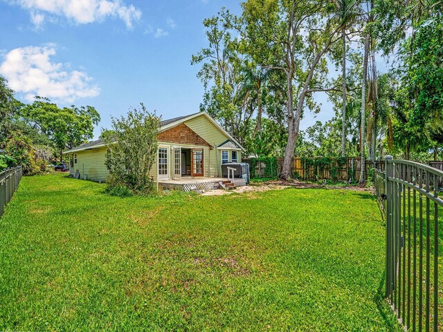 14808 Lake Magdalene Cir, Tampa, FL 33613 - view of yard with a patio area