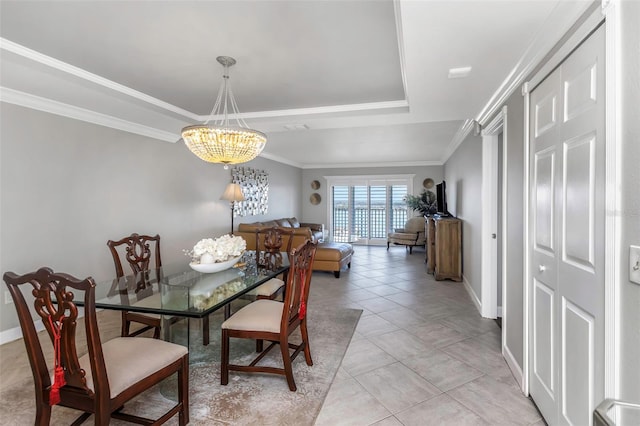 7300 Sun Island Dr S Unit 1505, South Pasadena, FL 33707 - dining space with a tray ceiling, ornamental molding, and a chandelier