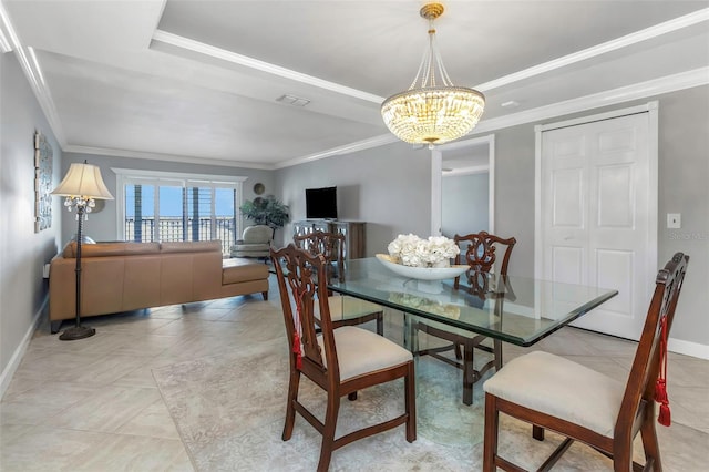 7300 Sun Island Dr S Unit 1505, South Pasadena, FL 33707 - dining space with crown molding, a chandelier, and a tray ceiling