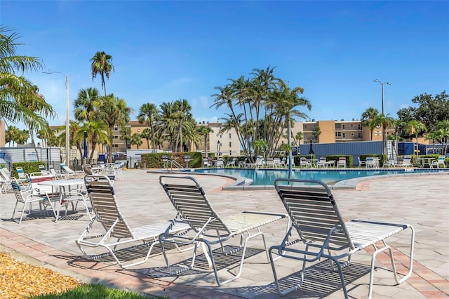 7300 Sun Island Dr S Unit 1505, South Pasadena, FL 33707 - community pool featuring a patio area