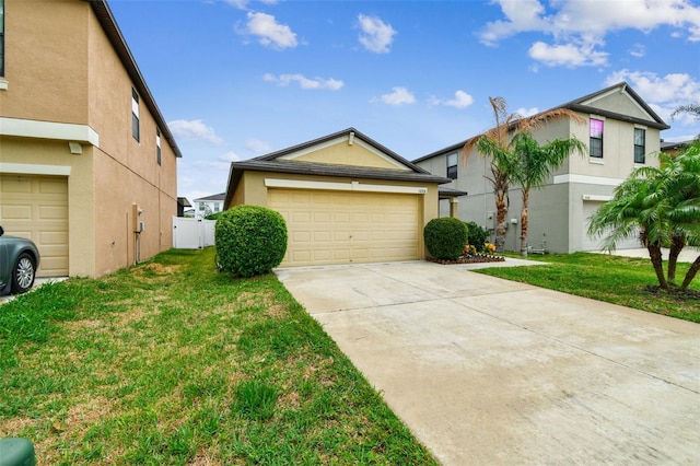 14206 Covert Green Pl, Riverview, FL 33579 - view of front facade with stucco siding and concrete driveway