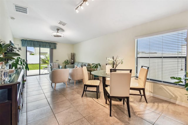 14206 Covert Green Pl, Riverview, FL 33579 - dining space featuring light tile patterned floors and baseboards