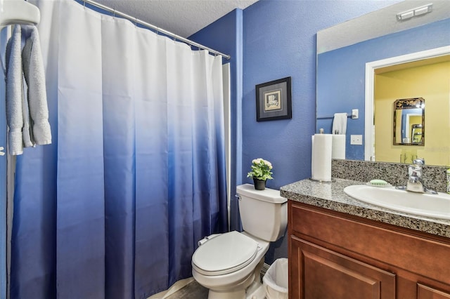 14206 Covert Green Pl, Riverview, FL 33579 - full bath featuring toilet, vanity, a shower with shower curtain, and a textured ceiling
