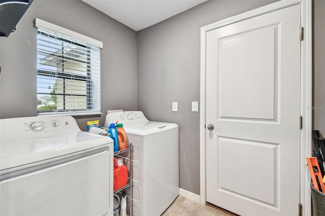 14206 Covert Green Pl, Riverview, FL 33579 - laundry area with independent washer and dryer and light tile patterned flooring