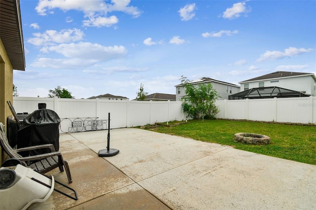 14206 Covert Green Pl, Riverview, FL 33579 - view of patio / terrace featuring a fire pit