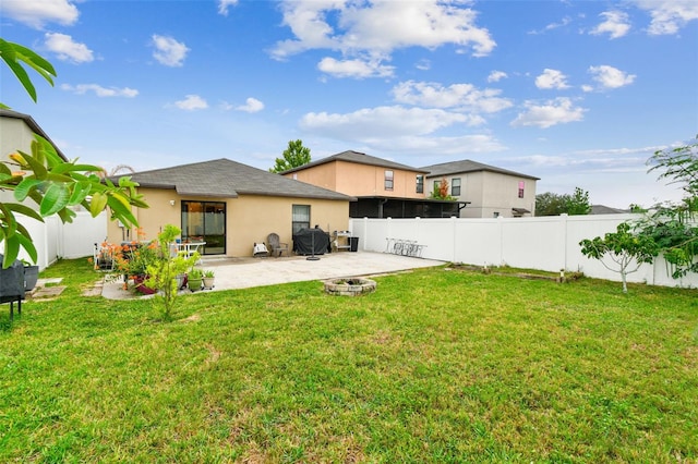 14206 Covert Green Pl, Riverview, FL 33579 - back of property with a patio and stucco siding
