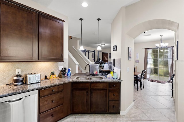 7001 Interbay Blvd Unit 242, Tampa, FL 33616 - kitchen with a sink, dishwasher, a chandelier, and dark brown cabinets