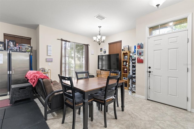 7001 Interbay Blvd Unit 242, Tampa, FL 33616 - dining space with a chandelier and baseboards