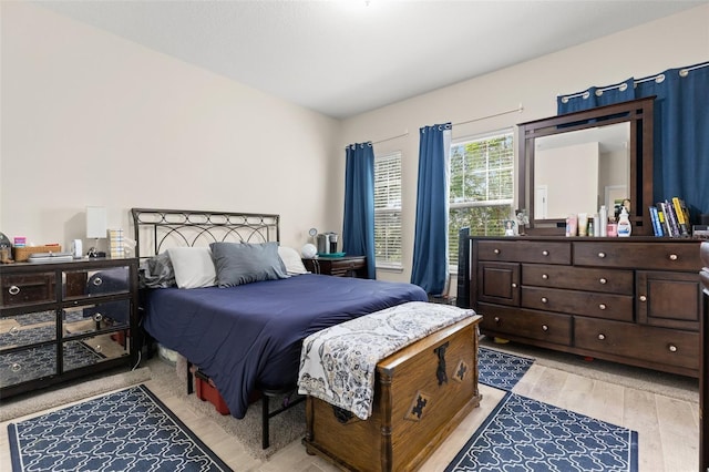 7001 Interbay Blvd Unit 242, Tampa, FL 33616 - bedroom featuring light wood-style floors
