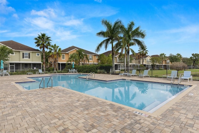 7001 Interbay Blvd Unit 242, Tampa, FL 33616 - community pool with a patio area and a residential view