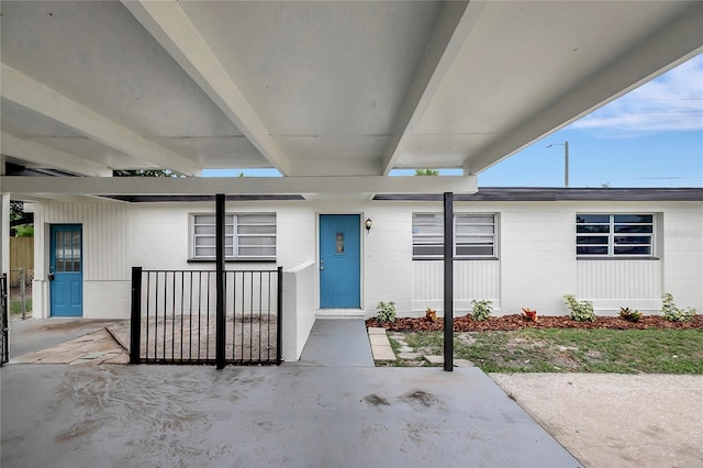 7524 Tidewater Trl, Tampa, FL 33619 - doorway to property featuring concrete block siding