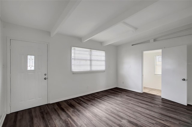 7524 Tidewater Trl, Tampa, FL 33619 - entrance foyer with beam ceiling, wood finished floors, and baseboards