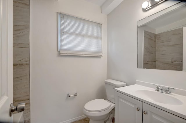 7524 Tidewater Trl, Tampa, FL 33619 - bathroom featuring vanity, toilet, and baseboards