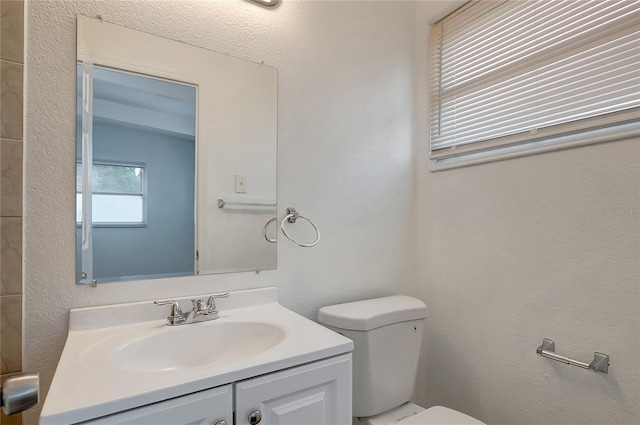 7524 Tidewater Trl, Tampa, FL 33619 - half bathroom featuring toilet and vanity