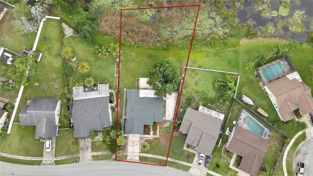 1717 Osprey Ln, Lutz, FL 33549 - aerial perspective of suburban area featuring property parcel outlined