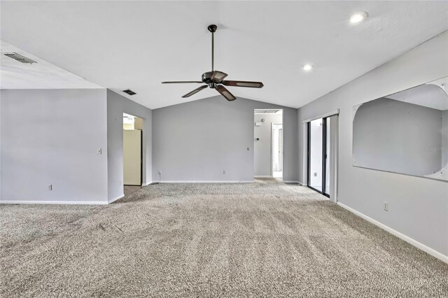 1717 Osprey Ln, Lutz, FL 33549 - spare room featuring lofted ceiling, carpet floors, a ceiling fan, baseboards, and recessed lighting