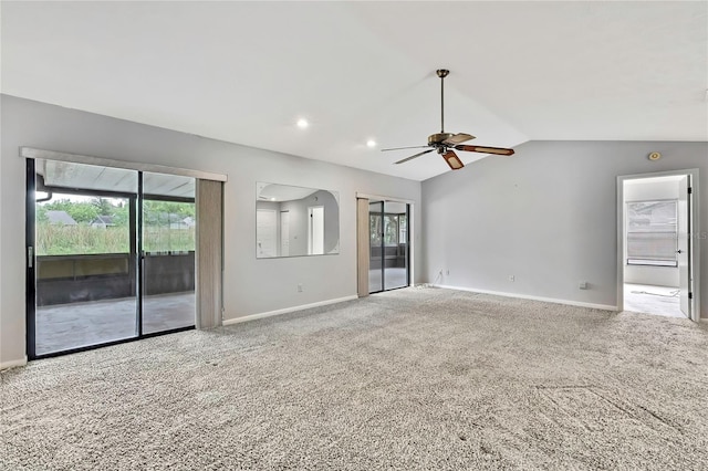1717 Osprey Ln, Lutz, FL 33549 - carpeted spare room with baseboards, vaulted ceiling, and ceiling fan