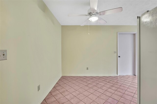 1717 Osprey Ln, Lutz, FL 33549 - unfurnished room featuring light tile patterned floors and ceiling fan
