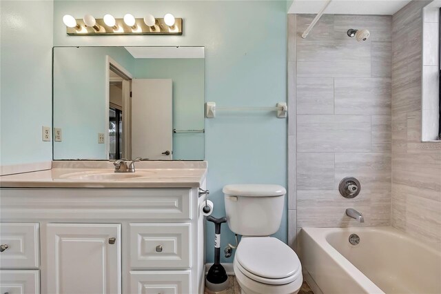 1717 Osprey Ln, Lutz, FL 33549 - bathroom featuring vanity, toilet, and washtub / shower combination