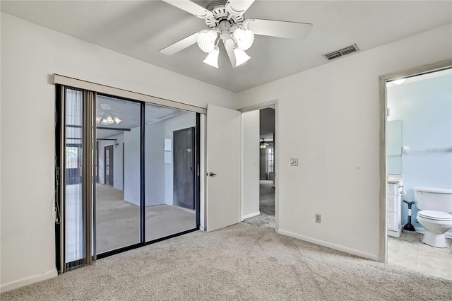 1717 Osprey Ln, Lutz, FL 33549 - unfurnished bedroom with carpet, baseboards, and ensuite bathroom