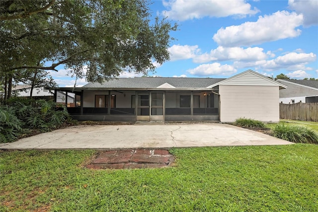 1717 Osprey Ln, Lutz, FL 33549 - back of property with a sunroom and roof with shingles