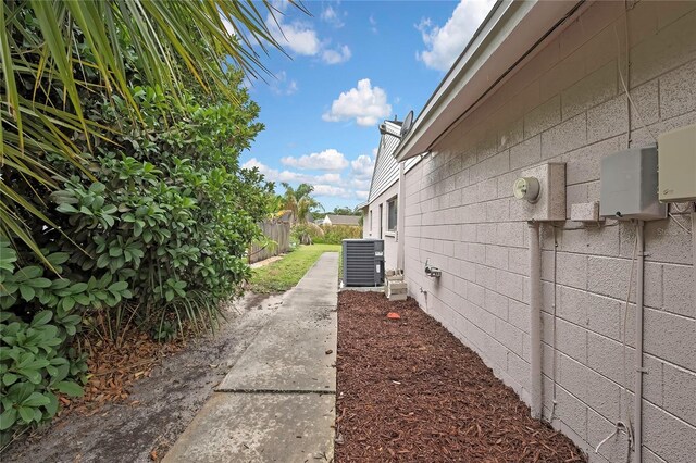 1717 Osprey Ln, Lutz, FL 33549 - view of home's exterior with central air condition unit