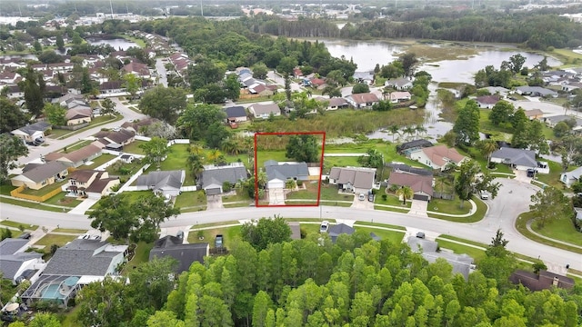 1717 Osprey Ln, Lutz, FL 33549 - aerial perspective of suburban area featuring a nearby body of water and property parcel outlined