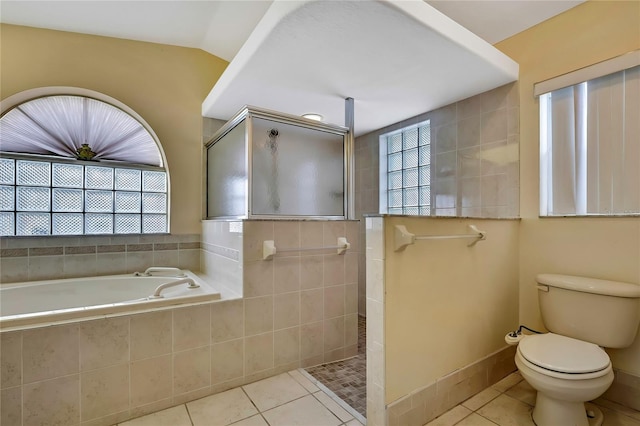 6121 Piedmont Dr, Spring Hill, FL 34606 - full bathroom featuring walk in shower, tile patterned flooring, a garden tub, and toilet
