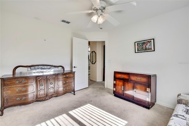6121 Piedmont Dr, Spring Hill, FL 34606 - bedroom with light colored carpet, baseboards, and ceiling fan