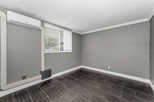 1301 S Howard Ave Unit A22, Tampa, FL 33606 - spare room featuring an AC wall unit, baseboards, and ornamental molding