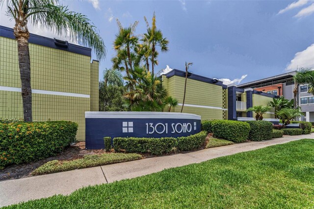 1301 S Howard Ave Unit A22, Tampa, FL 33606 - community / neighborhood sign featuring a lawn