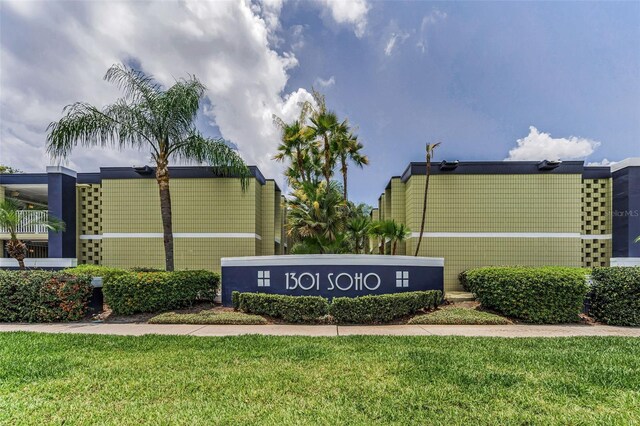 1301 S Howard Ave Unit A22, Tampa, FL 33606 - community / neighborhood sign featuring a lawn