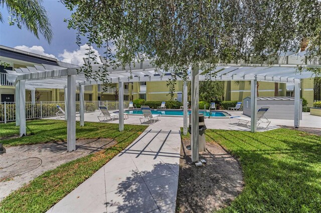 1301 S Howard Ave Unit A22, Tampa, FL 33606 - view of home's community with a pergola, a pool, and a patio area