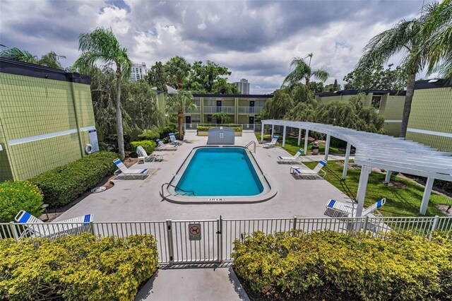 1301 S Howard Ave Unit A22, Tampa, FL 33606 - community pool featuring a patio area and a pergola
