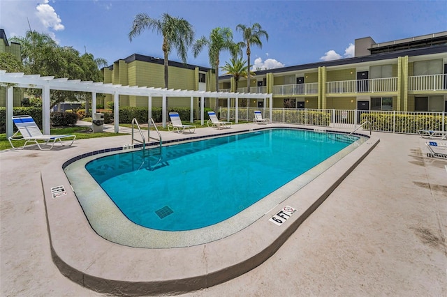 1301 S Howard Ave Unit A22, Tampa, FL 33606 - community pool with a pergola and a patio