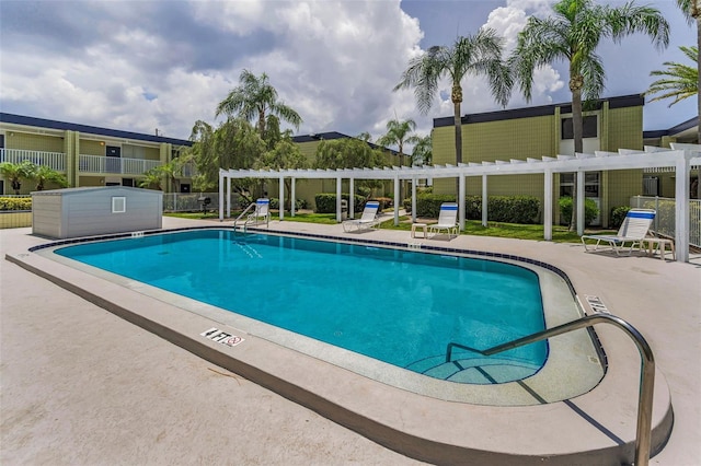 1301 S Howard Ave Unit A22, Tampa, FL 33606 - community pool with a pergola and a patio