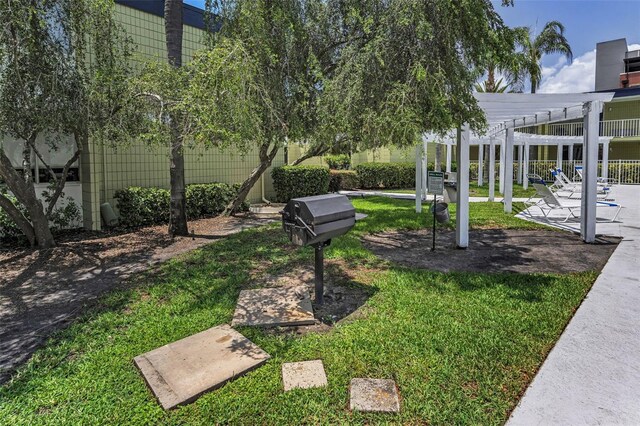 1301 S Howard Ave Unit A22, Tampa, FL 33606 - view of yard with a pergola and a patio