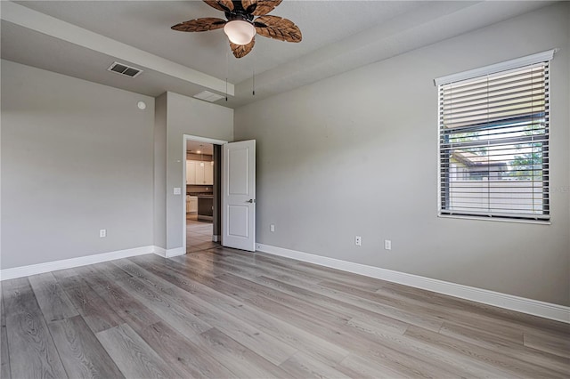 19974 Bluebird Meadow Dr, Lutz, FL 33558 - unfurnished room with a ceiling fan and light wood-style floors
