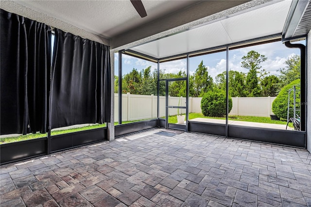 19974 Bluebird Meadow Dr, Lutz, FL 33558 - unfurnished sunroom featuring a ceiling fan