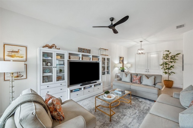 32490 Tree Of Life Ave, Wesley Chapel, FL 33543 - living area featuring a ceiling fan
