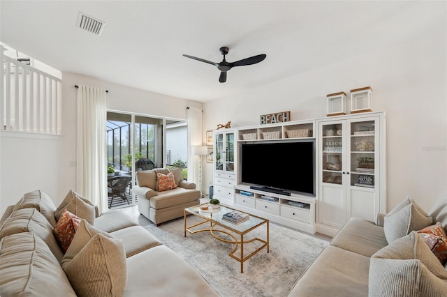 32490 Tree Of Life Ave, Wesley Chapel, FL 33543 - living room featuring a ceiling fan