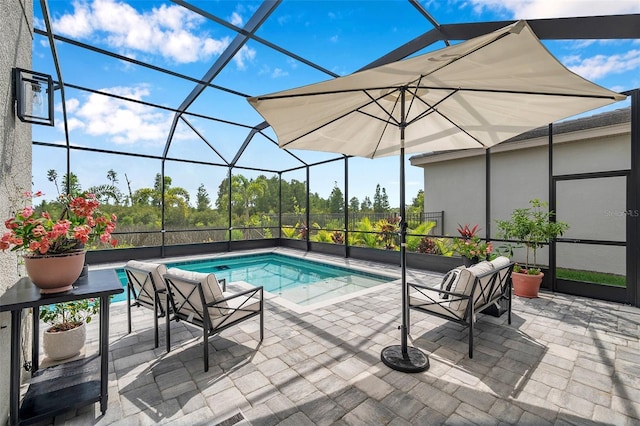 32490 Tree Of Life Ave, Wesley Chapel, FL 33543 - swimming pool featuring a patio area and glass enclosure