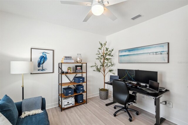 32490 Tree Of Life Ave, Wesley Chapel, FL 33543 - office space featuring light wood-style flooring, baseboards, and a ceiling fan