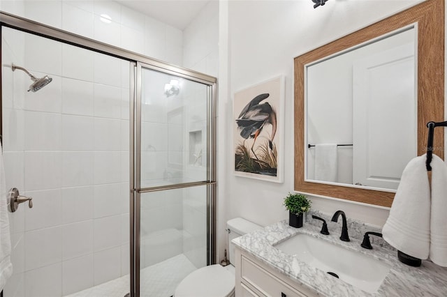 32490 Tree Of Life Ave, Wesley Chapel, FL 33543 - bathroom with vanity, toilet, and a shower stall