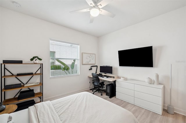 32490 Tree Of Life Ave, Wesley Chapel, FL 33543 - bedroom featuring light wood-type flooring, baseboards, and an office area