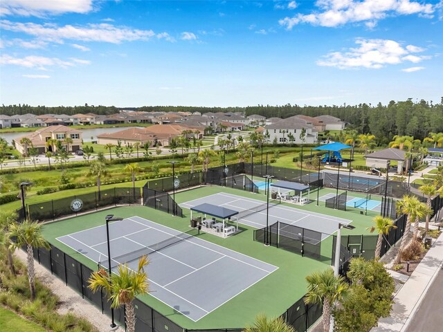 32490 Tree Of Life Ave, Wesley Chapel, FL 33543 - view of tennis court with a residential view
