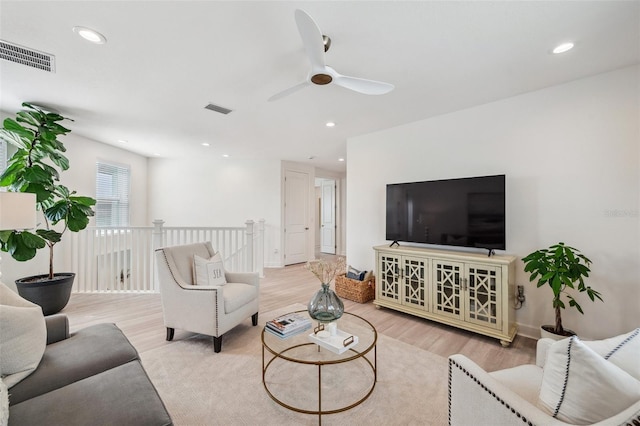 32490 Tree Of Life Ave, Wesley Chapel, FL 33543 - living area with a ceiling fan, wood finished floors, and recessed lighting