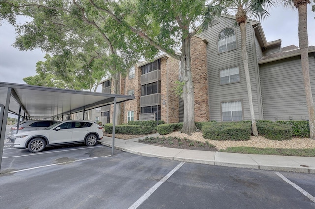 2500 Winding Creek Blvd Unit G307, Clearwater, FL 33761 - view of partially covered parking lot